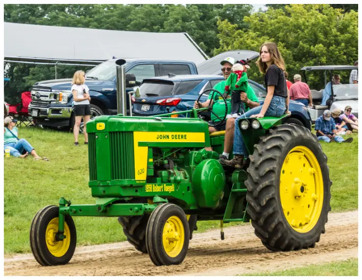 Rock River thresheree Tractor Ride with people Rock River thresheree Tractor Ride with people