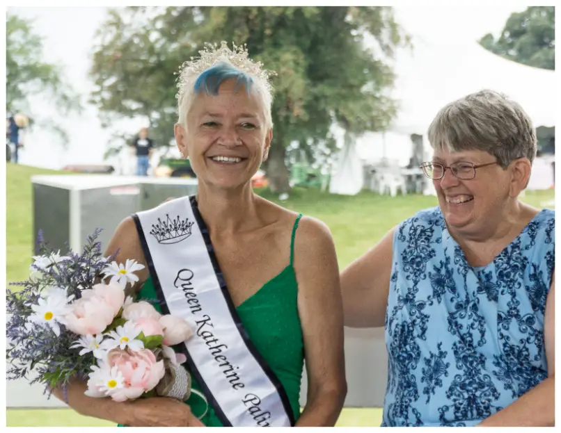 Rock River thresheree Woman With Award and Flowers Rock River thresheree Woman With Award and Flowers