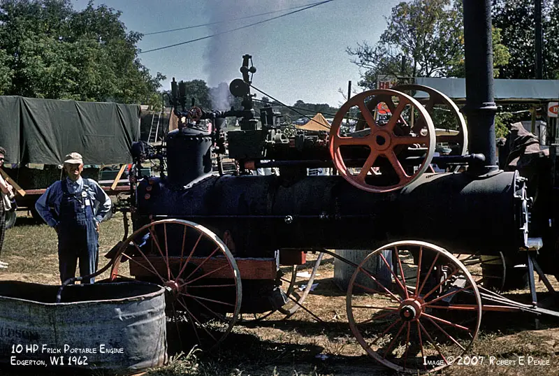 Rock River Thresheree Old Tractor With Man Rock River Thresheree Old Tractor With Man