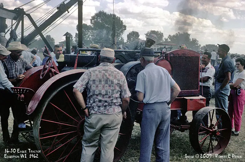 Rock River Thresheree People Gathering around red tractor Rock River Thresheree People Gathering around red tractor
